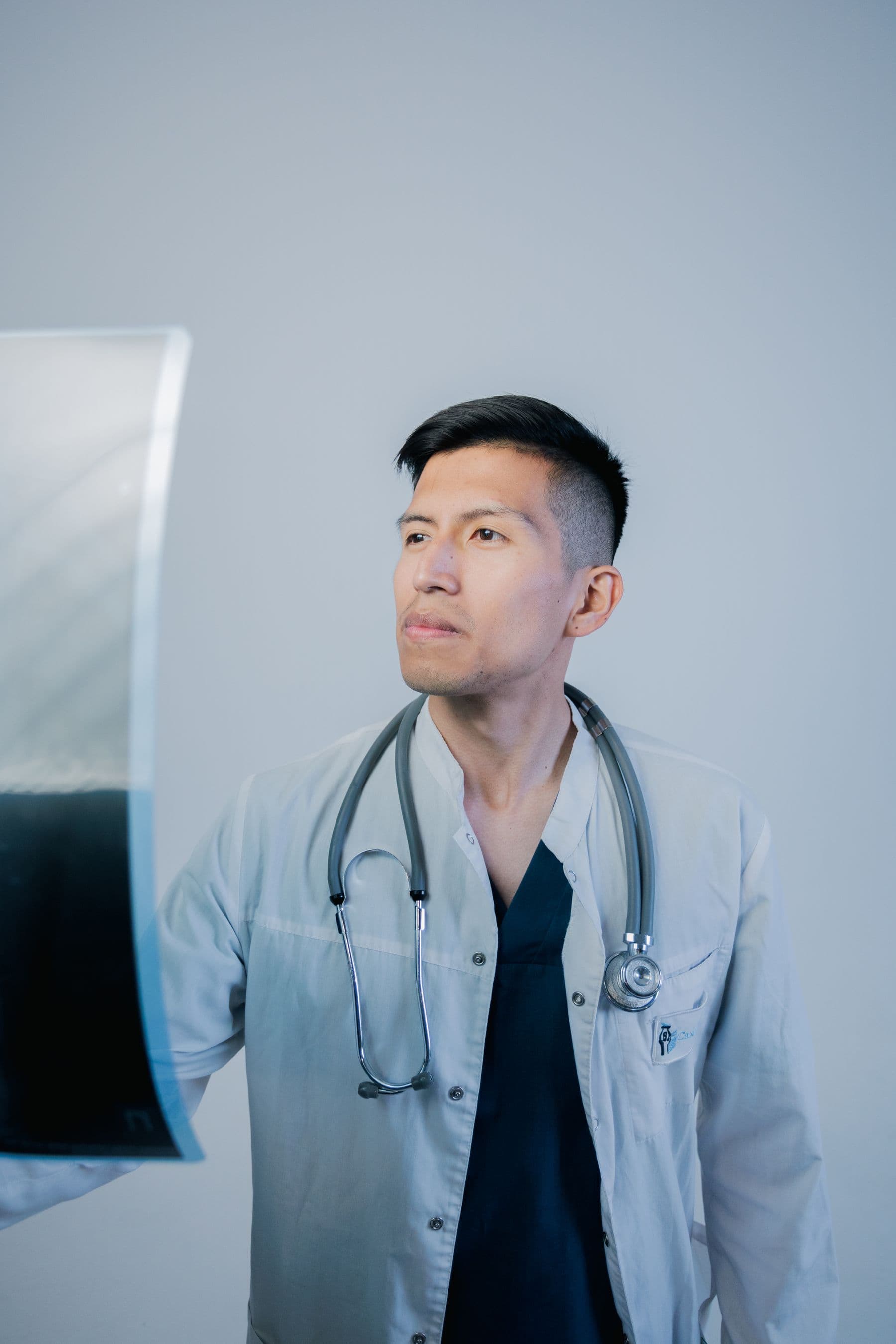 Dr. Whitfield reviewing a patient's diagnostic imaging